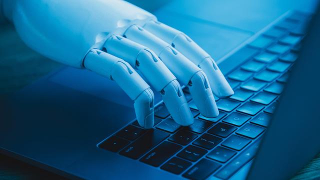 Robo-hand typing on a keyboard