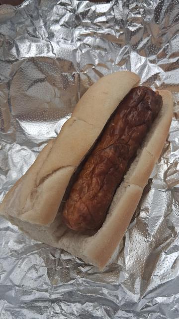 A lone sausage too small for the bun.