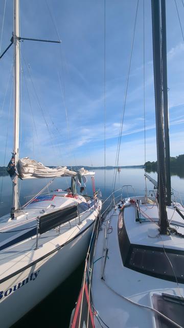 Pack of two sailboats in the morning.