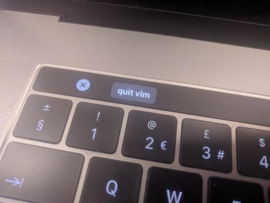 edited photo of a quick bar from MacBook Pro with a "quit vim" quick action present