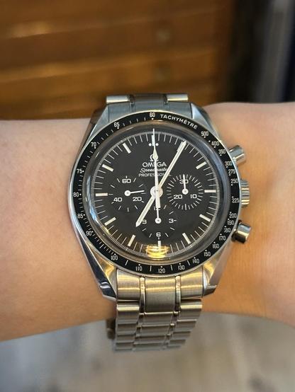 Wrist shot of an Omega Speedmaster Professional.
