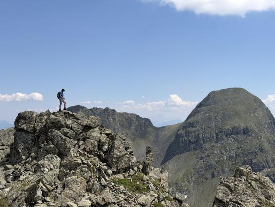 It’s me. I’m on a mountain. A minor peak. There are larger ones around. You should always leave more challenge for the next time. That’s how you keep longing.