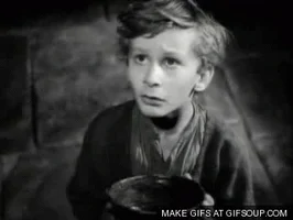 Small boy holding up a bowl, saying "Please, sir, may I have some more," from the movie Oliver Twist, after the book by Charles Dickens.