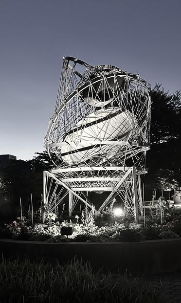 sculpture is titled Galaxy and was created by artist Gerald Gladstone in 1966 (Thnx Weirdfoodie!)
