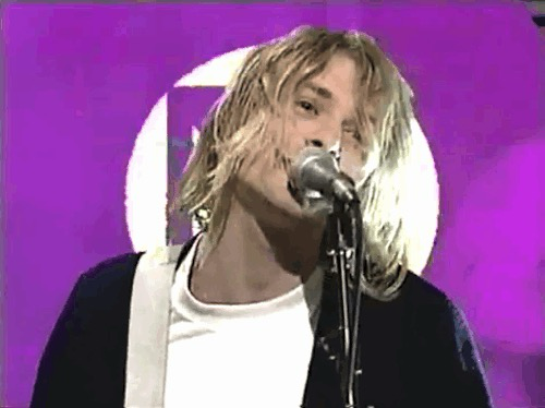 Gif of Kurt Cobain sininging.