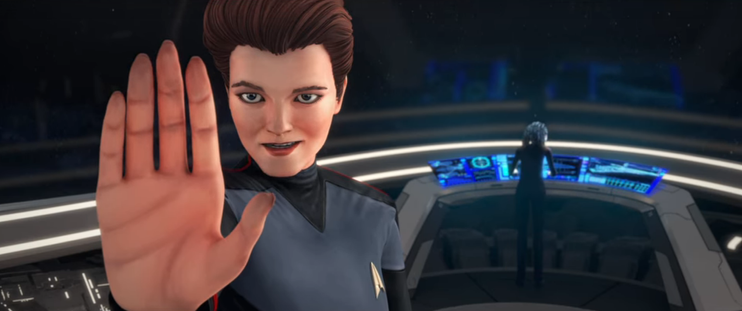 A shot from Star Trek: Prodigy showing a close-up shot of Hologram Janeway holding up her hand in an authoritative way to the Diviner (who is off camera in front of her). They are on the bridge of the Protostar. From E110