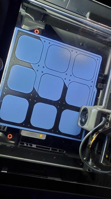 A 3x3 base plate being printed