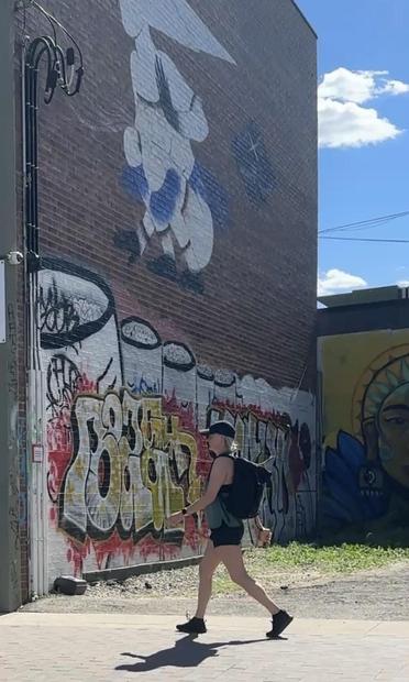 Graffiti and someone walking