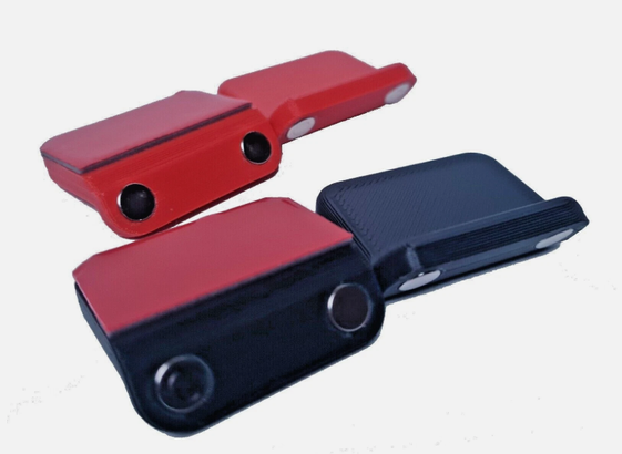 Image of a red and a black set of magnetic shifter mods used with Thrustmaster T300 wheel.