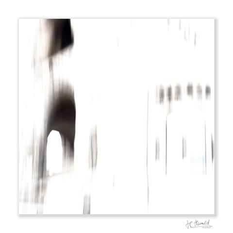 A square image with white frame and a white background. Only a few very blurred grey-brown details are visible. On the left are a few larger areas suggesting a round arch; on the right are a few vertical lines and a row of six rectangles forming a flat horizontal arch.
What can be seen here only as a faint outline is the Kaiser Wilhelm Memorial Church in Berlin. It has been a ruin since the Second World War, but has been preserved as a memorial. 

This image is protected by copyright and may not be used without my permission – particularly not for AI training purposes.
