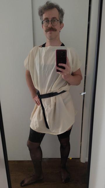 Myself dressed in the tunica mentioned above with tights and a black belt to sinch it in.