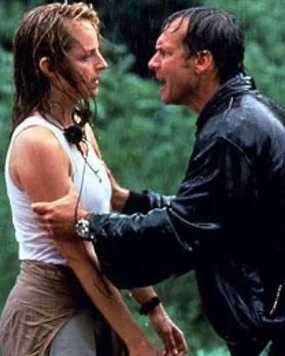 A very wet stormchasing couple from the film Twister (1996); Bill Harding emphatically grasping Jo Harding who is trying to get her ass killed by a tornado because she's still haunted by her dad being sucked off