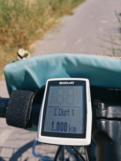 Compteur kilométrique de vélo indiquant 1000km parcourus