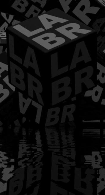 A cube with LABR on all side hovering over rippling water.