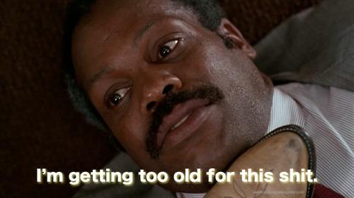 Actor Danny Glover in Lethal Weapon. His iconic "I'm getting too old for this shit" line is captioned at the bottom of the image.
