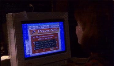 Gif from the opening scenes of the 1995 film, 'The Net,' depicting a CRT computer screen monitor, with extremely of-their-time graphics, as Sandra Bollocks' character - *dramatic pause* - orders a pizza online. 

WHAT?? 

It's the future. 

(Not pictured: Cyberbob. Sorry, you'll just have to watch the film.)