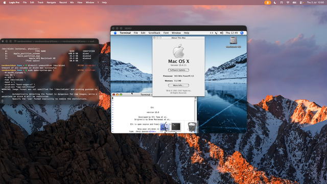 The macOS 26.2 desktop on my big monitor (1920x1080). The background is from macOS 10.12, a mountain range.

There a two windows. One terminal on the left running QEMU and showing the HDD stats. Another window of QEMU in PPC running that same HDD. Mac OS X 10.4.11 is running and so is EVi in a terminal window in QEMU, all pulled from the backup of my iBook G3's HDD.