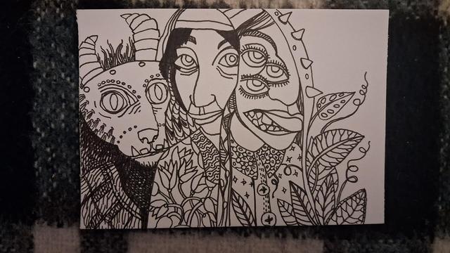 Black and white line drawing of several interlocking faces, some with too many eyes, some with fur and horns, wearing floral patterns overgrown with leaves.