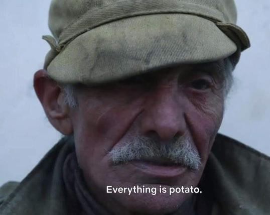 old man with a white mustache says everything is potato