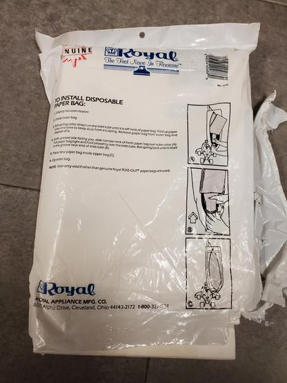 The back of the pack of Royal Type A bags. This photo was shot after removing the tape, and tearing up the packaging in the process.