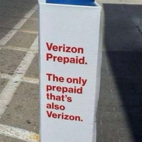 Standing signage reads “Verizon Prepaid. The only prepaid that’s also Verizon.”