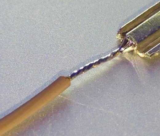 Broken key blade soldered to copper wire (blade teeth intentionally cropped out)