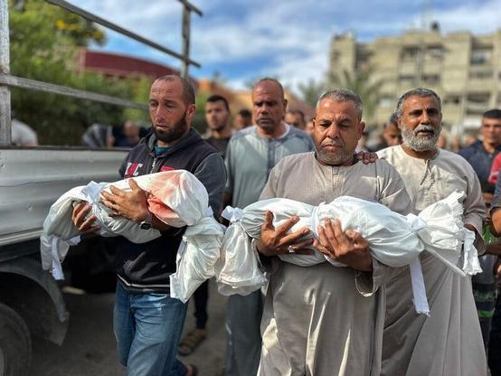 The bodies of twin 9-year-old brothers Moaz and Moataz, who were killed in Israeli airstrikes that killed at least 60 civilians overnight, are carried at Nasser Medical Complex in Khan Younis, southern Gaza Strip, on 15 May 2025. Doaa Albaz ActiveStills