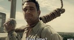Man in a noose looking smugly to another prisoner off-screen, captioned: "First time?"