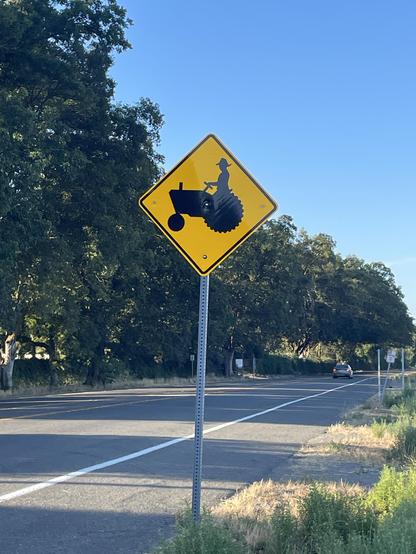 Traffic sign warning of farm equipment