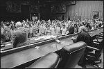 People taking the Oath of Allegiance during a naturalization ceremony at the U.S. District Court, Brooklyn, New York City. From The Library of Congress