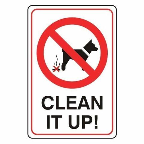 A no dog poop sign with the words “Clean it up!” beneath a red circle with a strike through, overlaying a symbol of a dog standing facing away from a steaming poo behind its hind legs.
