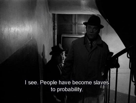 Alphaville 1965, Lemmy Caution descends an institution staircase with another man and remarks, "I see. People have become slaves to probability."