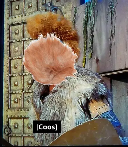 This is the same image that @nocontexttrek has posted, but haphazardly edited in order to replace the guard's face with a ball of hair (Star Trek aficionados will recognize that as a Tribble).
Closed caption has been edited to read "Coos".