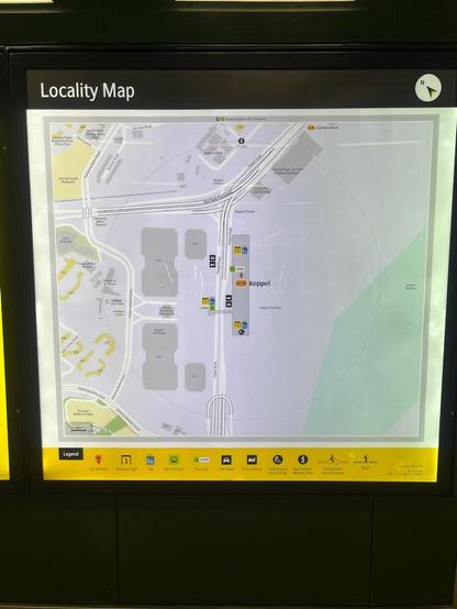 A lit “Locality Map” sign showing the Keppel area map with landmarks, roads, and transport icons.