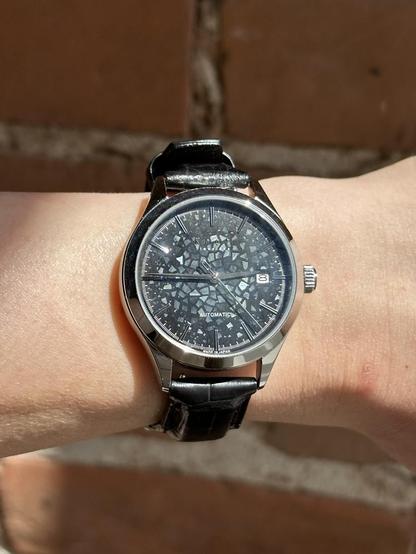 Wrist shot in harsh sunlight.