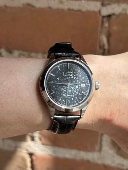 Wrist shot with half and half shadow/sunlight.