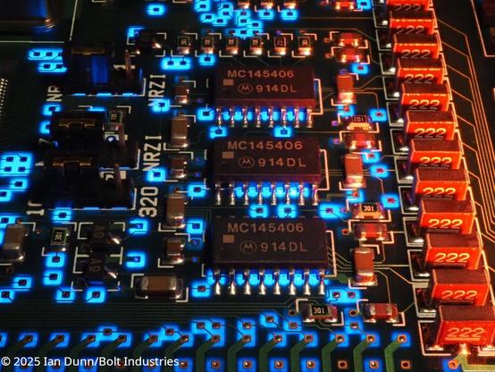 Macro photo of a vintage circuit board with led lights from various angles