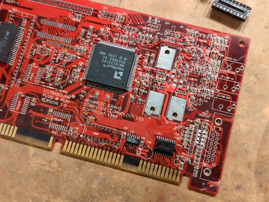 partially-assembled card with the large chip in the middle mounted along with a couple of others. the large chip has the distinctive AMD logo.