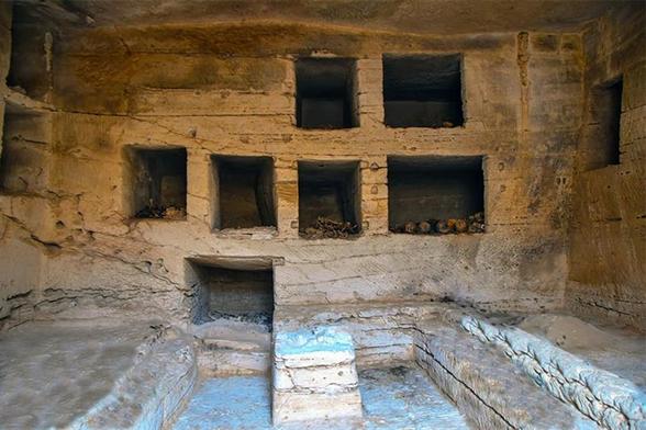 A photo of rock cut tombs discovered in the Marina el-Alamein site.