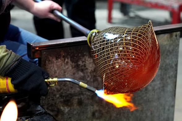 Jenni Kemarre Martiniello says after she started, working with glass became addictive for her.