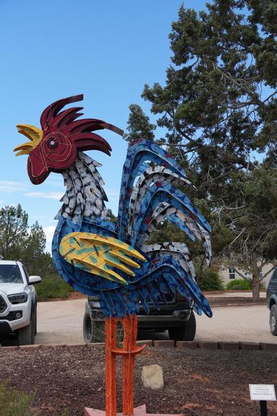 Full metal statue of a rooster