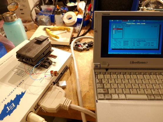 the device programmer running while connected to a Libretto with the host PC (DOS) software running on it