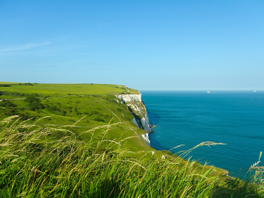 A short hike to the White cliffs of Dover

Dover, famously known as the gateway to England, is separated from continental Europe by only few miles of sea - The English channel. For thousands of years, it has worked as a vital defence against the invasion of outside forces. The Dover castle is one of the biggest castle in England for a reason. The castle stands on top of the cliffs proudly guarding the coast of England. Apart from the castle, the cliffs itself are a treat to the eyes. The massive white structures standing like a wall […]

