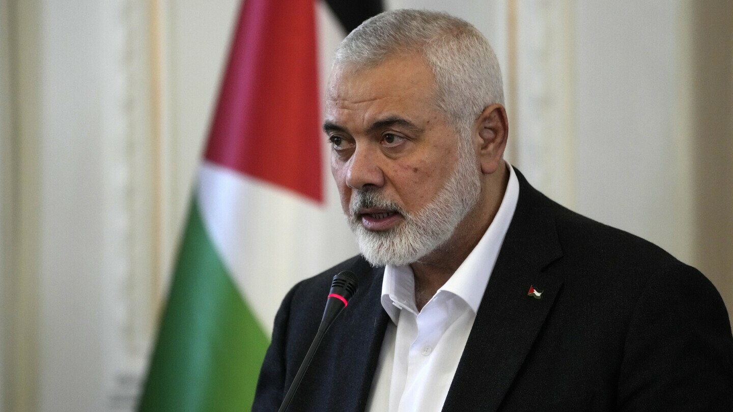 FILE - Hamas chief Ismail Haniyeh speaks during a press briefing after his meeting with Iranian Foreign Minister Hossein Amirabdollahian in Tehran, Iran, March 26, 2024. (AP Photo/Vahid Salemi, File)