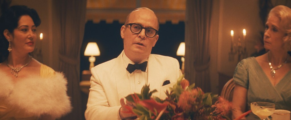 FEUD, (aka FEUD: CAPOTE VS. THE SWANS), Tom Hollander as Truman Capote (center), Pilot', (Season 2, ep. 201, aired Jan. 31, 2024). photo: ©FX / Courtesy Everett Collection