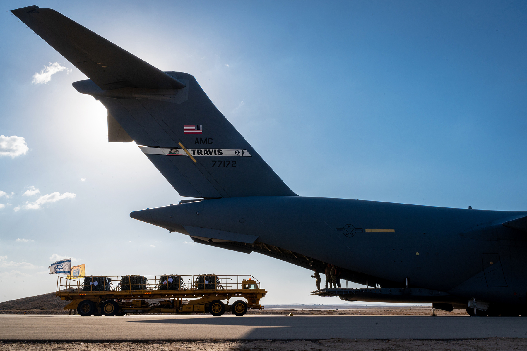 U.S. Air Force Airmen assigned to Ramstein Air Base, Germany, offload cargo to the Israeli military, Oct. 15, 2023, at Nevatim Air Force Base. The mission provided the Israeli military with additional resources, which included vital munitions. (Photo: U.S. Air Force Photo by Senior Airmen Edgar Grimaldo)