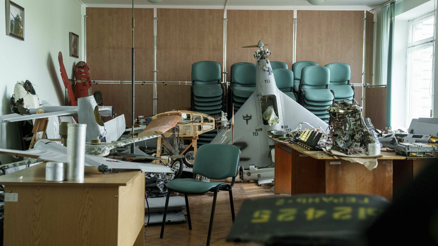 Parts of downed Shahed drones launched by Russia are piled in a storage room of a research laboratory in Kyiv, Ukraine, on Aug. 28, 2024. (AP Photo/Evgeniy Maloletka)