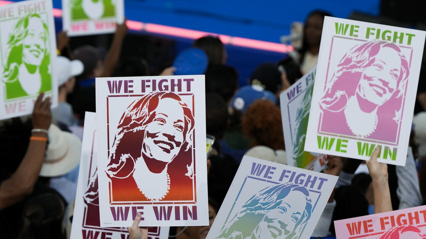 Attendees display signs for Democratic presidential nominee Vice President Kamala Harris during a campaign rally Thursday, Oct. 24, 2024, in Clarkston, Ga. (AP Photo/Mike Stewart)