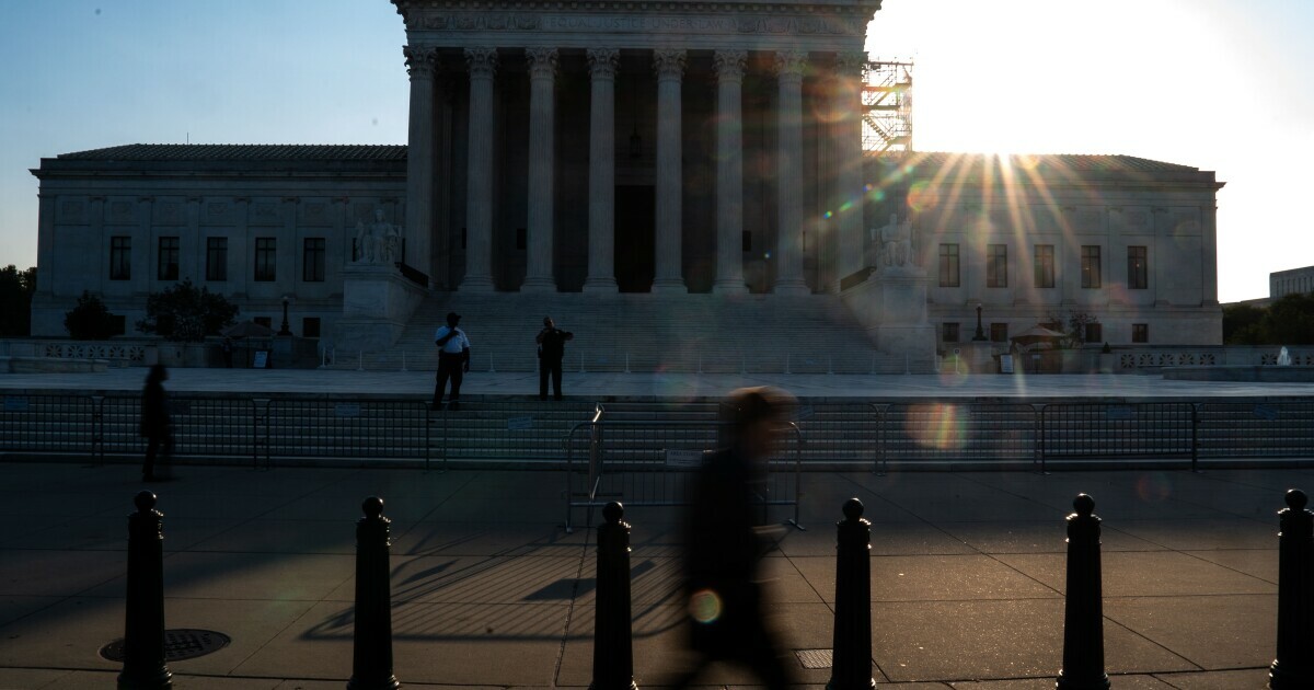 The U.S. Supreme Court put on hold a lower court order that stopped Virginia from purging its voter rolls.