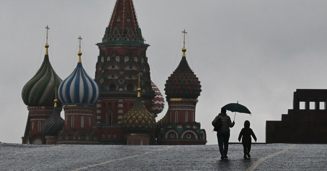 Walking on Red Square in Moscow in 2022. A bill passed by lawmakers would ban materials promoting the “conscious refusal to have children” for Russians.